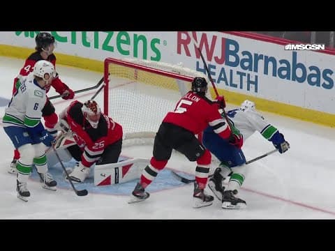 Jake DeBrusk scores a powerplay goal against the New Jersey Devils