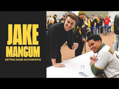 Autographs aren’t just for the fans, Jake Mangum jumped in too.