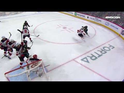 Ryan Hartman scores a goal against the New Jersey Devils