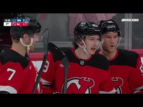 Thatcher Demko scores a goalie save against the New Jersey Devils