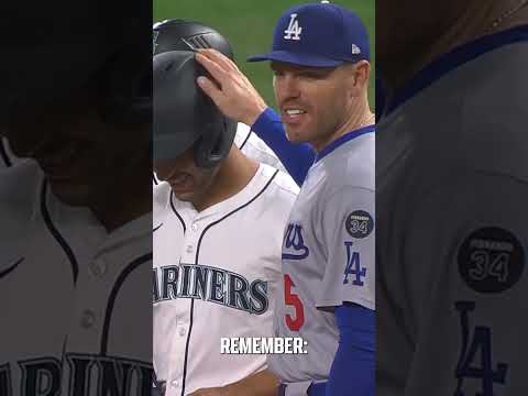 Harry Ford collected his 1st MLB hit & his idol Freddie Freeman was there to meet him at 1st base 🥹